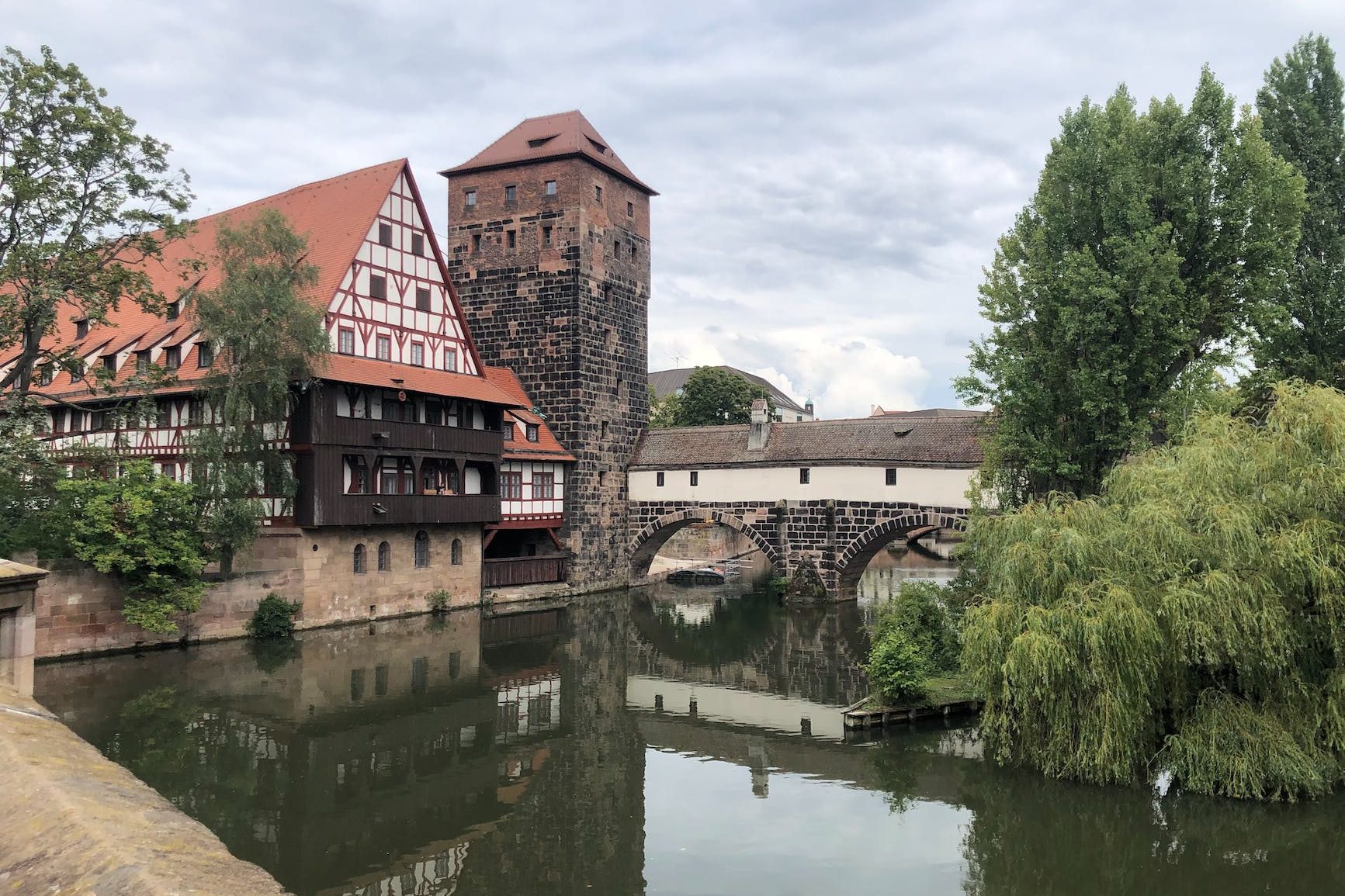 water tower by a river in nuremberg germany